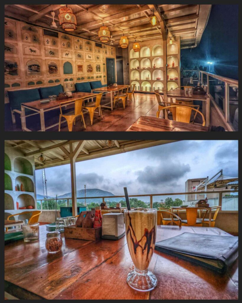 Blue Door Rooftop Restaurant in Bundi, offering a delightful dining experience with stunning panoramic views of the city's historic landmarks and a vibrant ambiance.