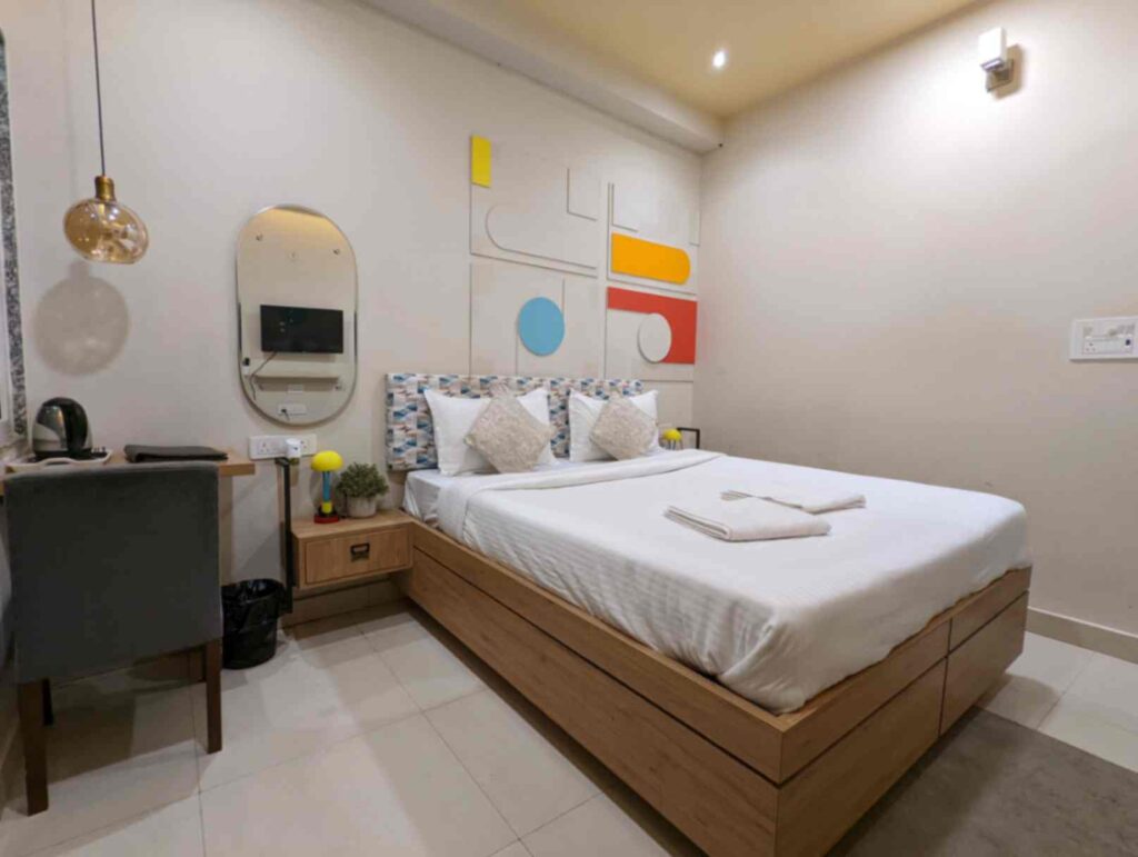 A cozy and comfortable room at Zostel Bundi with simple decor and a warm, welcoming atmosphere.