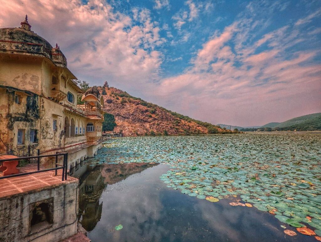 Sukh Mahal in Bundi, Rajasthan, a historic lakeside palace overlooking the tranquil Jaitsagar Lake, surrounded by lush greenery and reflecting the opulence of Bundi's royal architecture.