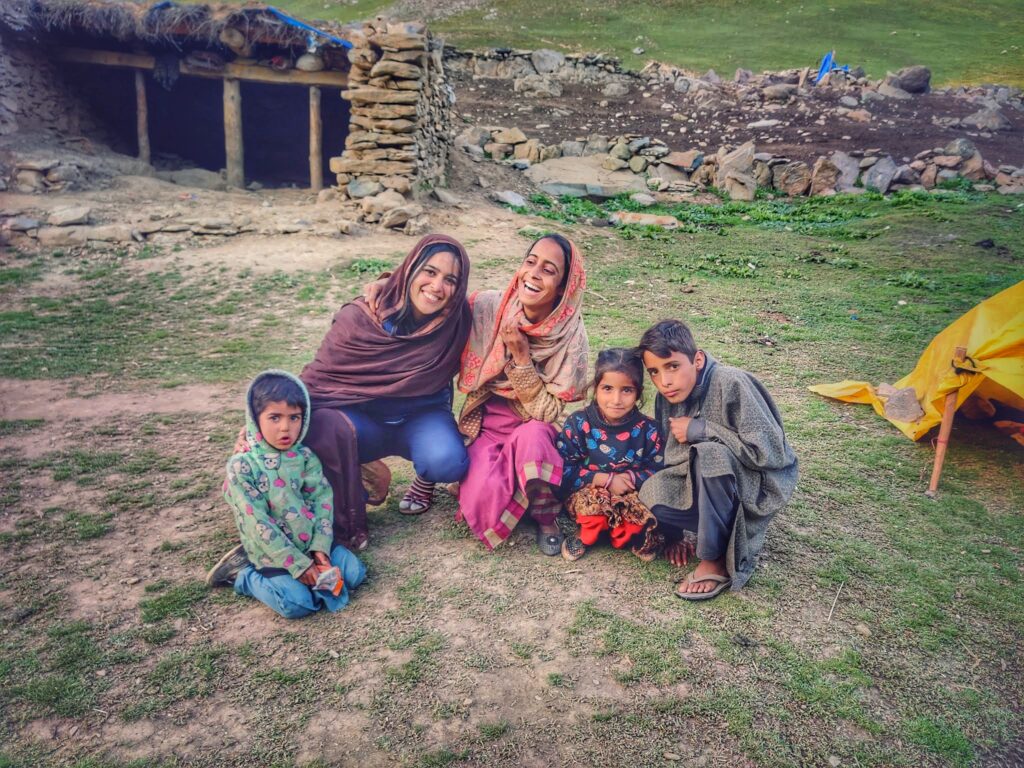"Interaction with Kashmiri nomads during the Kashmir Great Lakes Trek, featuring a local lady inviting me to her traditional home (visible in the background) and offering her shawl. It was such a authentic experience."