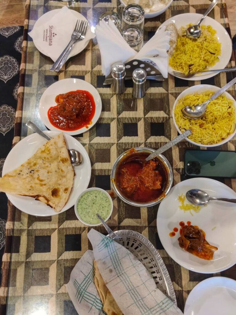 Kashmiri meal with Kashmiri pulao, along with mutton rogan josh & naan.