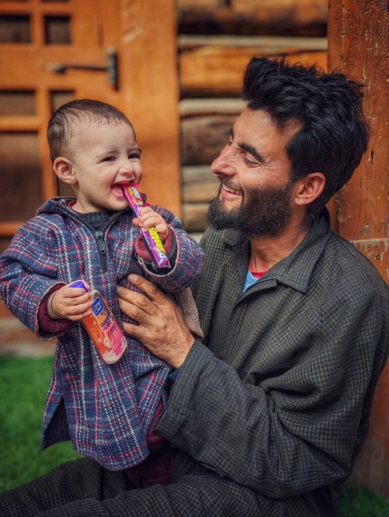 A heartwarming moment of a father with his baby daughter in Tulail Valley.