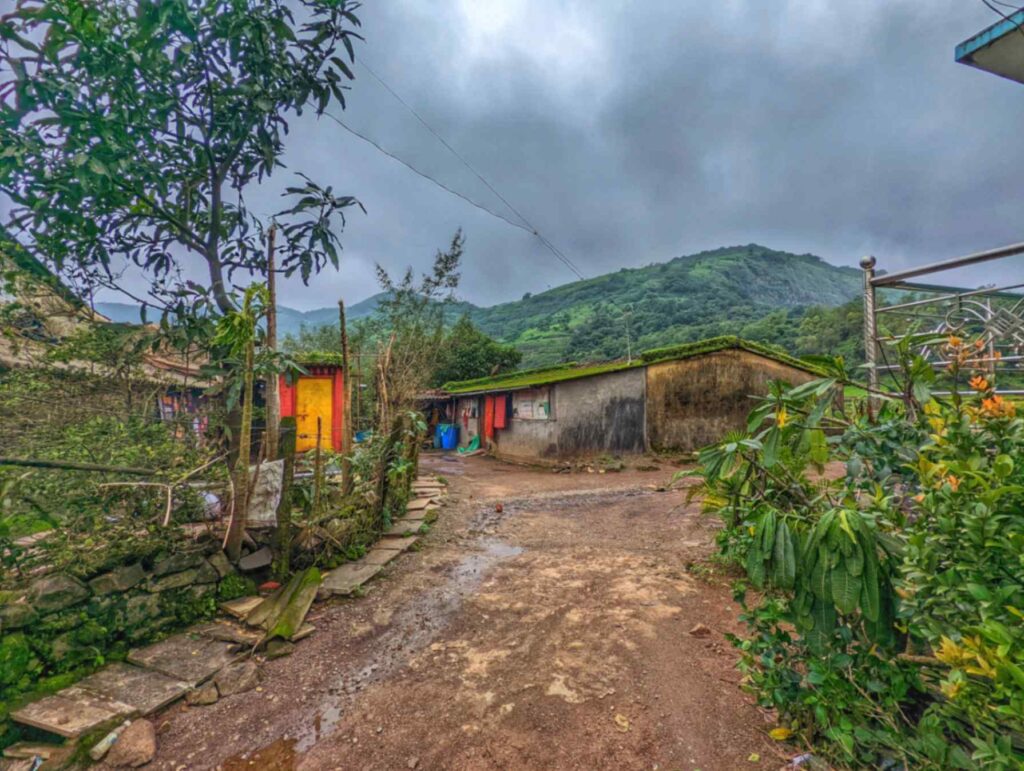 Picturesque Bendewadi Village, Maval – A serene rural hamlet nestled in the Sahyadri hills, surrounded by lush greenery and misty valleys.